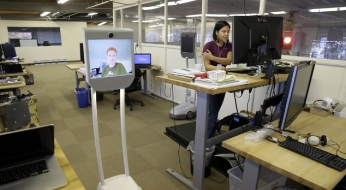 Telepresence robots allow employees to ‘beam’ into work