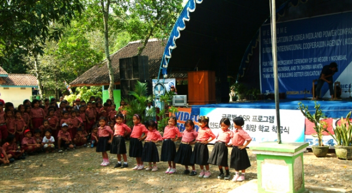 KOMIPO helps build schools in Indonesia