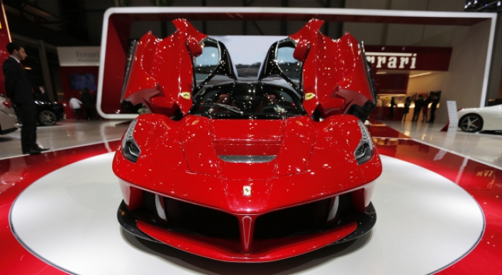 Ferrari hybrid hits resurgent market