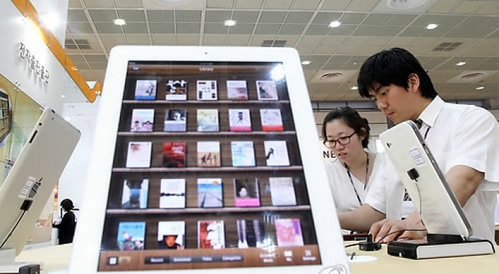 E-book market to expand 80% in 2013: analysts
