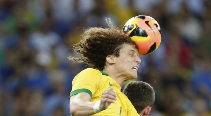 Brazil held 2-2 by England as Maracana re-opens