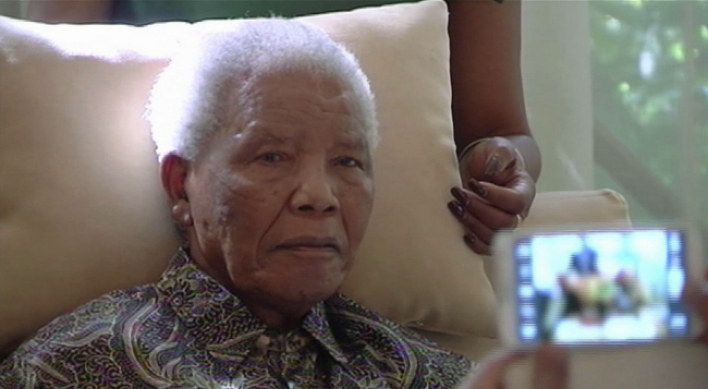 Mandela back in hospital in 'serious but stable' condition