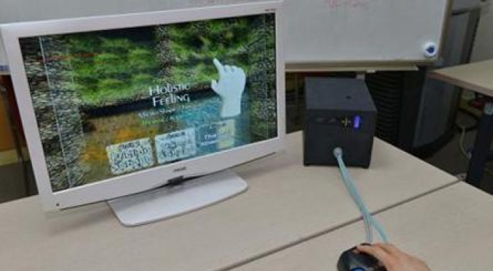 Computer mouse delivers sensory info to users