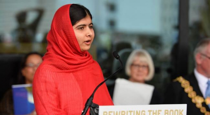 Malala says books can defeat terrorism at U.K. library opening