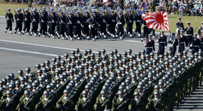 Japan’s push for collective self-defense stirs dispute