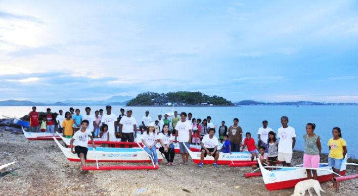 Filipinos in Korea help Haiyan survivors float