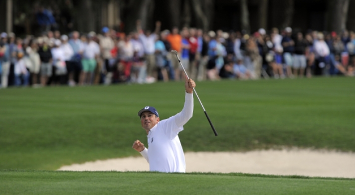 Kuchar chips in for RBC Heritage win