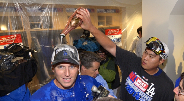Dodgers beat Giants 9-1 to win West title