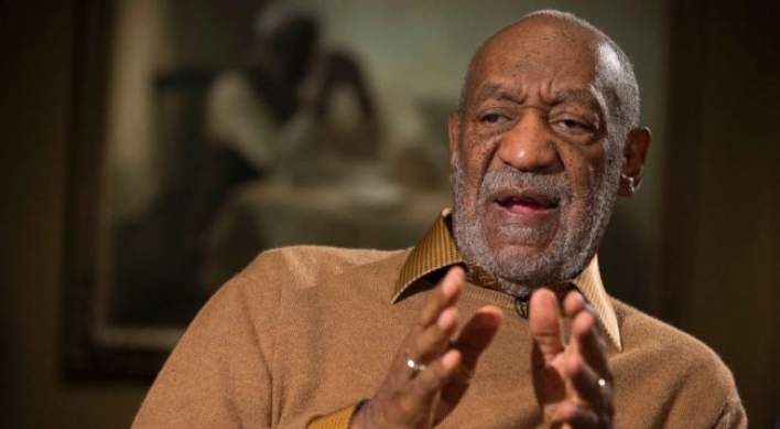 Bill Cosby jokes about rape allegations