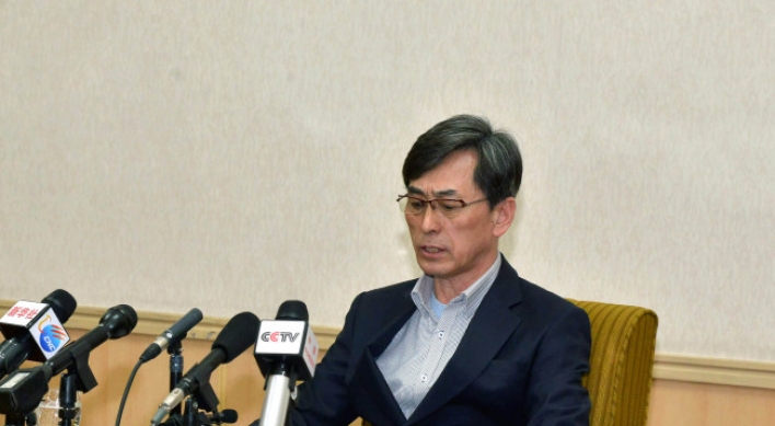S. Korea urges N. Korea to free two arrested nationals