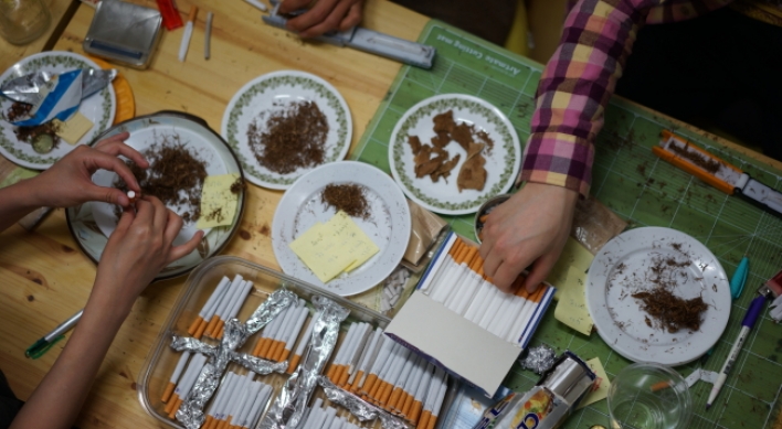 Cigarette making becomes art project