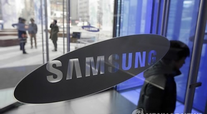 Samsung Q4 net tumbles on smartphone, chip woes