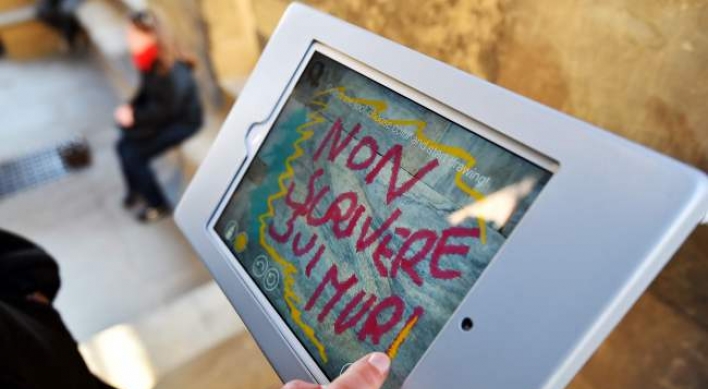 Itching to graffiti? Do it digitally on Florence treasures