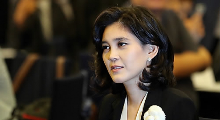 Samsung heir apparent's arrest puts younger sister in spotlight
