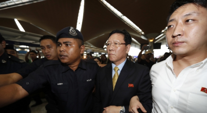 Expelled N. Korea envoy fires final salvo from airport