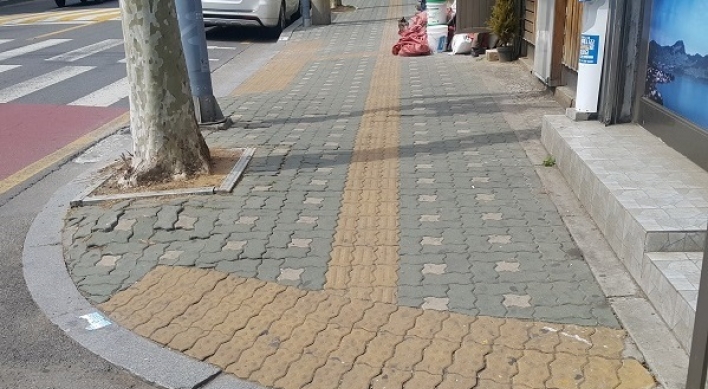 Paving for visually impaired disappearing
