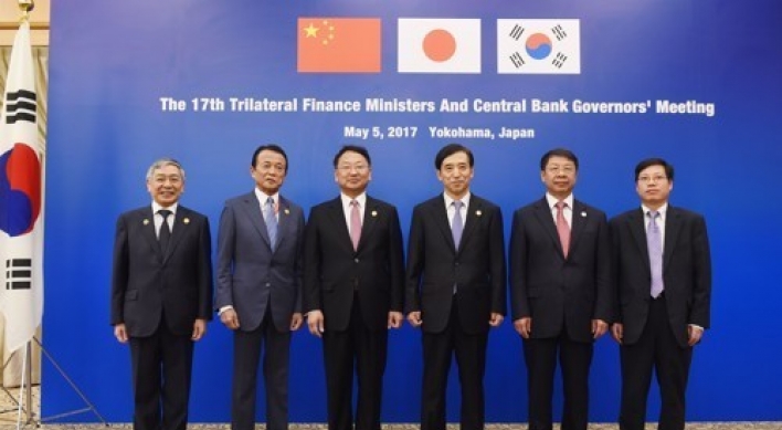 Korea, Japan, China vow to resist protectionism