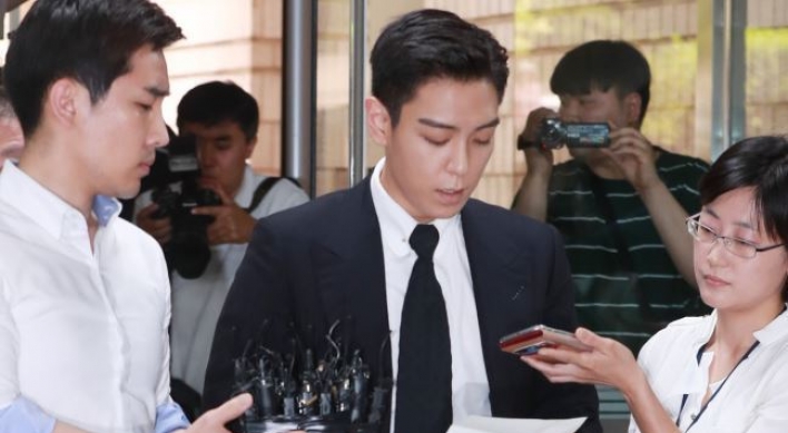 T.O.P attends first hearing for marijuana charges, apologizes to mother