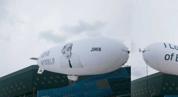 BTS hints at new project by flying mysterious blimps