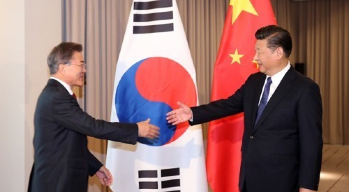 Korea, China agree to bring exchange, cooperation back onto 'normal' track