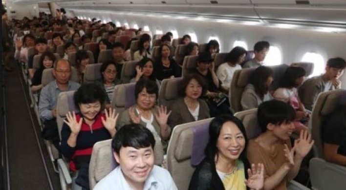 Koreans give themselves low scores on travel etiquette