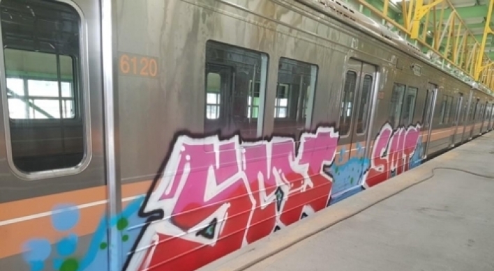 British graffiti duo sentenced to jail for vandalizing Seoul trains
