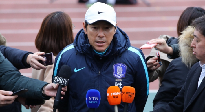 S. Korea football coach vows to beat Japan, defend regional title
