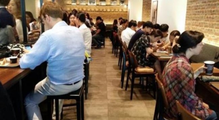 Storm in a teacup? Tempers flare online over coffee shop ‘beggars’
