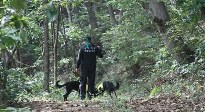 Police to investigate body found in woods