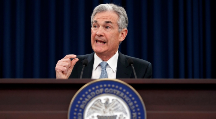 Fed leaves rates unchanged, says inflation close to target