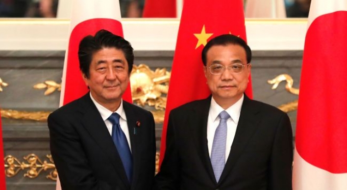 Japan’s Abe accepts China invite, but no date set