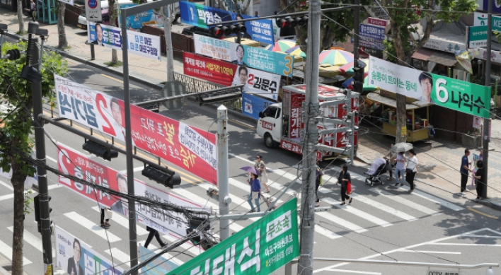 Citizen referred to prosecution for removing campaign banners