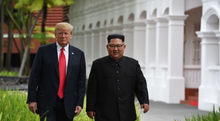 [US-NK Summit] Trump, Kim take stroll after working lunch: report