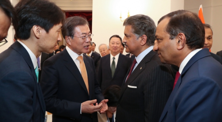 Moon urges Mahindra chief to reinstate fired workers at SsangYong