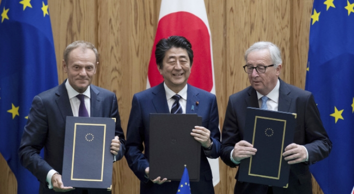 EU, Japan sign massive trade deal as US puts up barriers