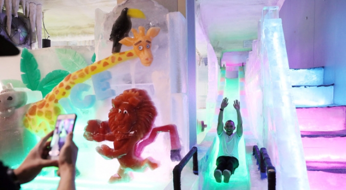[Photo News] Feeling the heat? Stay cool at Hongdae’s Ice Museum