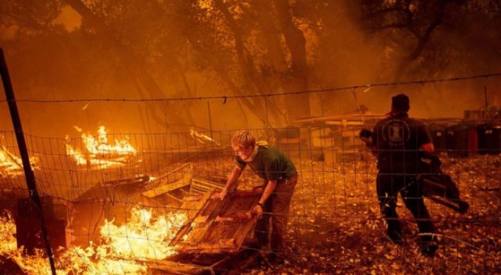 Firefighters make progress in California but weather not promising