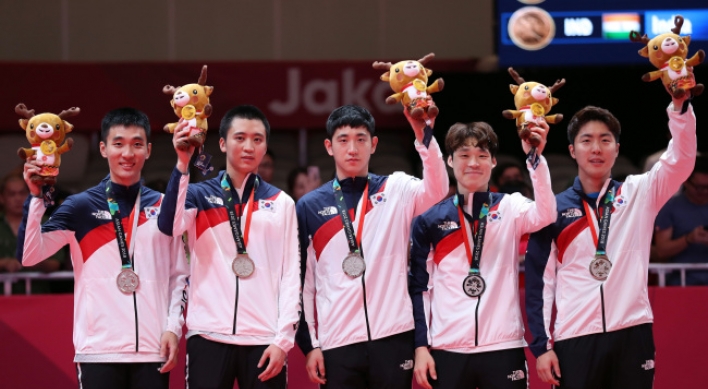 Korea takes team silver in men's table