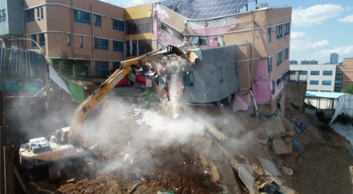 Authorities begin demolition of collapsing kindergarten