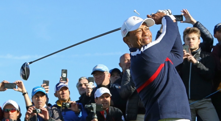 Happy times for Tiger Woods heading to a Ryder Cup