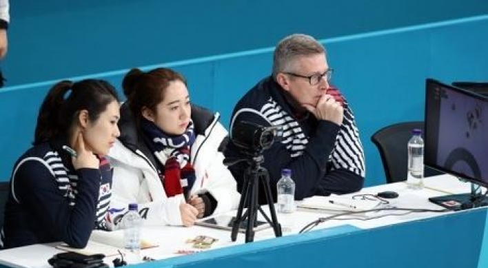 Team Kim's Canadian coach backs curlers' abuse claims