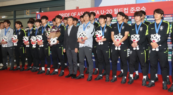 S. Korean players receive heroes' welcome