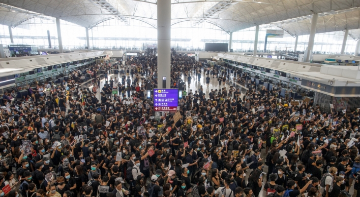 Flights resume at Hong Kong airport after protests