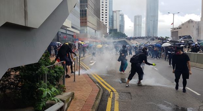 Fire, tear gas and petrol bombs as Hong Kong engulfed by chaos