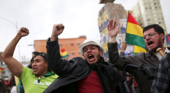 Bolivia's Morales resigns after losing backing of security forces