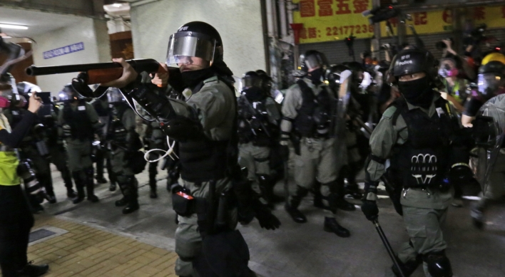 [Newsmaker] Hong Kong police shoot protester as flashmob rallies target rush hour