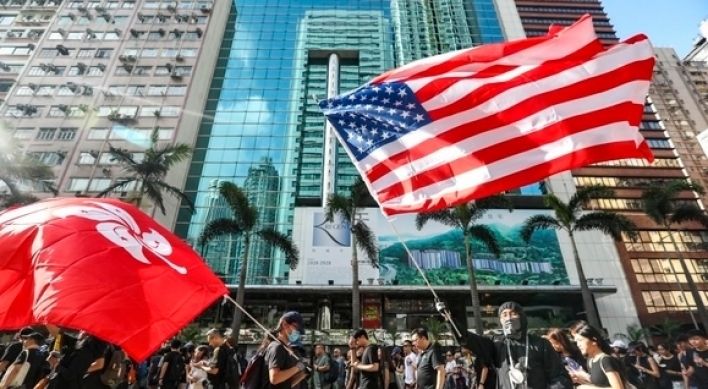 Trump signs law supporting Hong Kong protesters