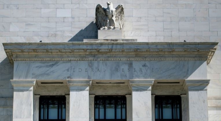 US Fed says will focus on low inflation, global economy