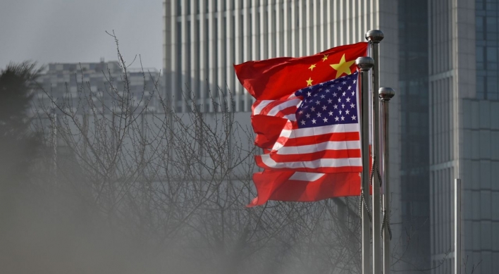 China revokes 3 Wall Street Journal reporters' credentials