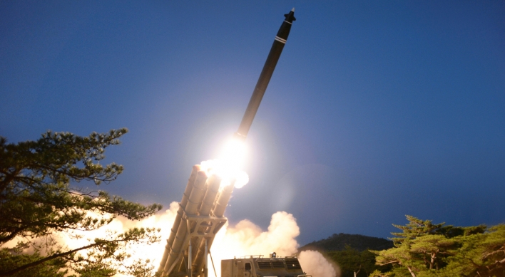 NK hails rocket test, US urges return to nuclear talks